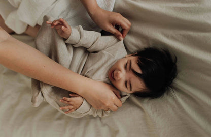 Sovdräkt för baby i 100% merinoull